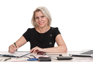 Mature business woman working in the office